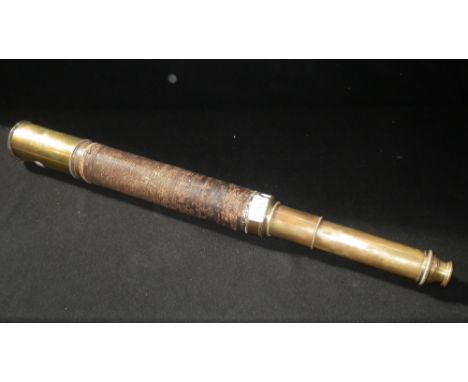 A BRASS AND STRING BOUND THREE-DRAW TELESCOPE, engraved Charles Pickard Skinner, RN  