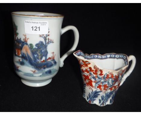 WORCESTER FIRST PERIOD: A CLOBBERED JUG 3.5" high and a blue and white transfer and polychrome jug in the Oriental style 5.25
