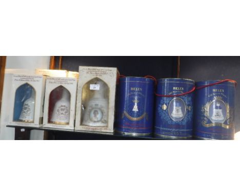 ELEVEN BELL'S SCOTCH WHISKY COMMEMORATIVE DECANTERS with contents in original boxes