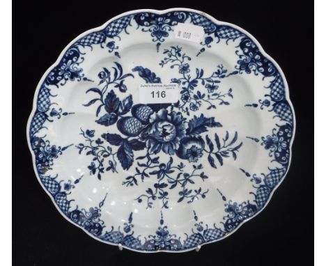 WORCESTER FIRST PERIOD: A BLUE AND WHITE DISH with rose and pine cone decoration 9.75" diameter