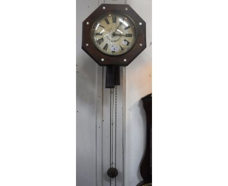 A VICTORIAN WALL CLOCK, with a circular painted dial, in an octagonal mahogany case with inlaid mother-of-pearl decoration, d
