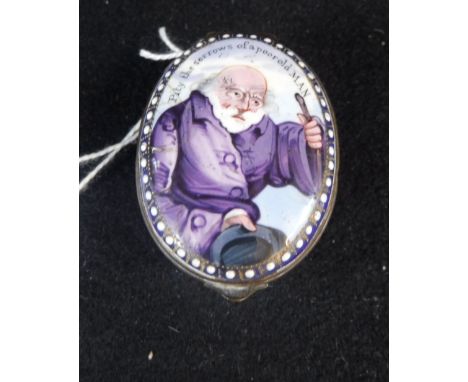 A 19TH CENTURY ENAMEL PATCH BOX, the lid with an old man 'Pity the sorrows of a poor man' with a blue base 2" wide