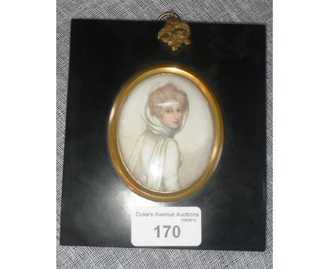 A PORTRAIT MINIATURE OF A LADY wearing a white head scarf and looking over her shoulder