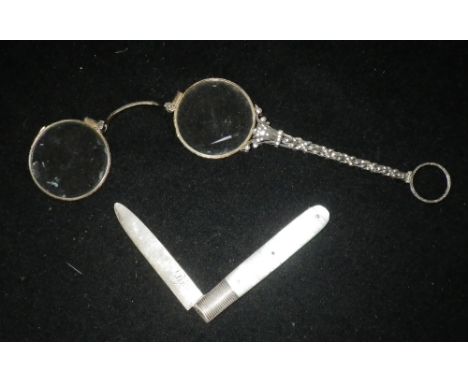 A SPRING LOADED WHITE METAL AND ROSE-CUT PASTE SET OF LORGNETTES and a mother-of-pearl silver bladed fruit knife (2)  