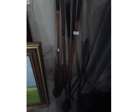 A selection of vintage golf clubs