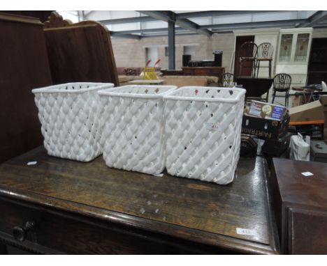 Three late 20th Century ceramic planter holders of lattice form