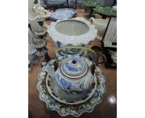 A selection of ceramics including jardinière, ceramic kettle, plated candelabrum and decorative metalic tankard etc