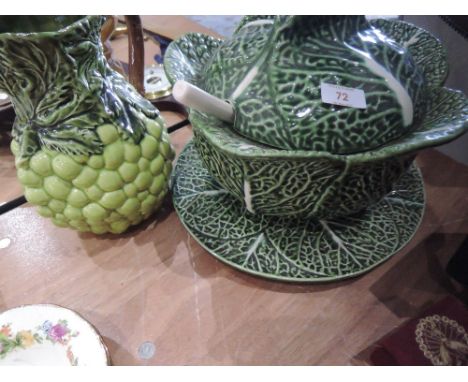 A majolika style cabbage tureen with ladle and similar jug