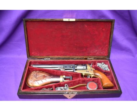 A Blank Firing Replica Colt Navy Revolver (af) in fitted wooden case with decorative copper Powder Flask and accessories