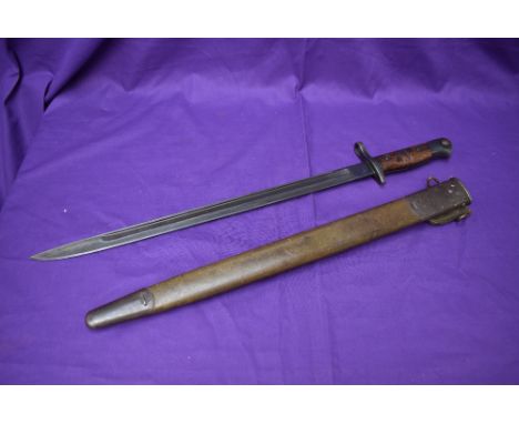 An American Bayonet for Enfield Rifle model 1913, no drain hole, marked on blade 1913, rubbed partly out, 1917 Remington on r
