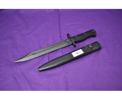 A British 1958 SLR Bayonet with metal scabbard, blade marked Arrow 59, grip marked L1A3 960-0257B, overall length 30cm