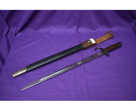 A British SMLE Bayonet Pattern 1907 with hooked quillon, marked on grip Crown T5E, blade Crown GR 1907 Wilkinson, several mar