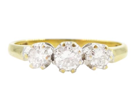 18ct gold three stone round brilliant cut diamond ring, London import mark 1987, total diamond weight approx 0.45 caratCondit