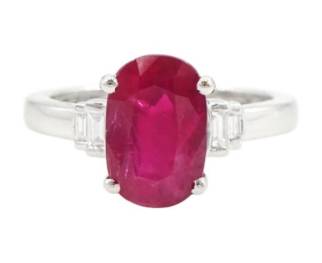 18ct white gold oval cut ruby and four stone baguette cut diamond ring, hallmarked, ruby approx 3.00 caratCondition Report:Ap