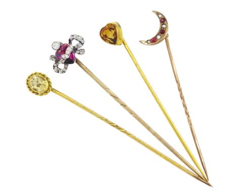 19th century ruby and old cut diamond heart and bow shaped stick pin, gold oval citrine stick pin and two other gilt heart sh