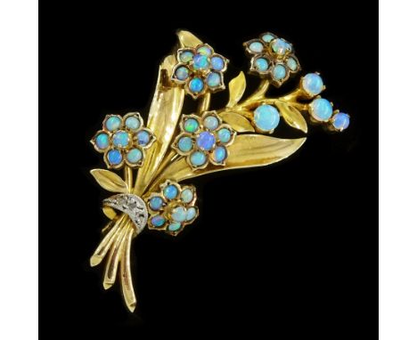 9ct gold opal flower brooch, with diamond set tie, hallmarkedCondition Report:Approx 6.05gm, back pin also 9ct, length = 40mm