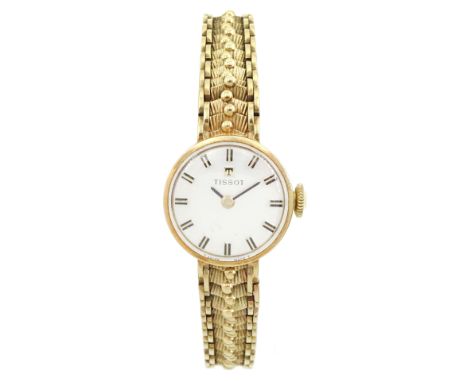 Tissot ladies 9ct gold manual wind wristwatch, on integral fancy 9ct gold link bracelet, hallmarkedCondition Report:Approx 16