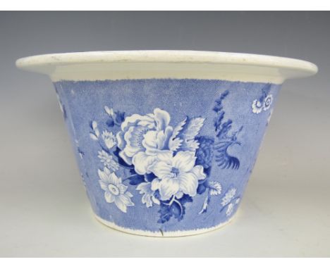 An early 19th Century blue and white transfer printed wash stand basin, decorated with a wild rose pattern, marked 'Semi-Chin