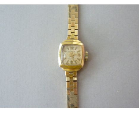 A 1960s lady's 9ct gold cased Accurist wrist watch, with Swiss made 21 jewel manual wind movement, silvered dial with baton m