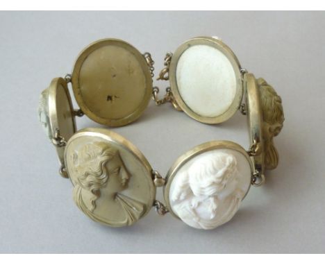 A Victorian Neoclassical lava cameo bracelet, comprising six oval tablets each bezel set and carved in bas relief with the pr