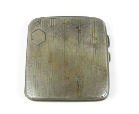 A George V silver cigarette case, of subtly convex cushion form, bearing engine turned banded decoration, Birmingham, 1929, 9