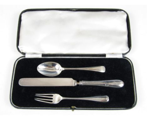 A cased George V silver three piece Christening set, comprising knife, fork and spoon, Sheffield, 1934, 64.5g 