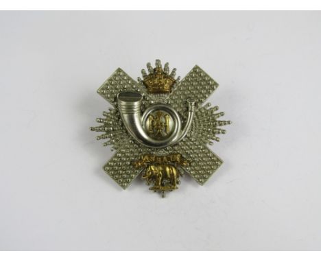 A Highland Light Infantry officer's cap badge bearing retailer's plaque of Anderson of Edinburgh 