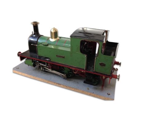 A live steam 7 1/4" gauge model railway locomotive, the 0-4-2 tank engine Bridget designed by Ken Swan, together with a bogey
