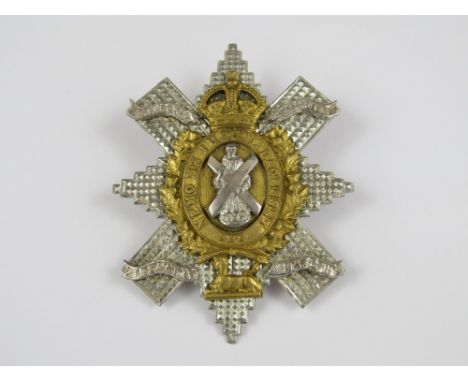 A Black Watch officer's cap badge stamped STERLING SILVER 