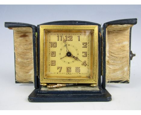 An Art Deco Selex travel / boudoir clock, with Swiss made movement, square face, Arabic numerals and engine turned case, in f