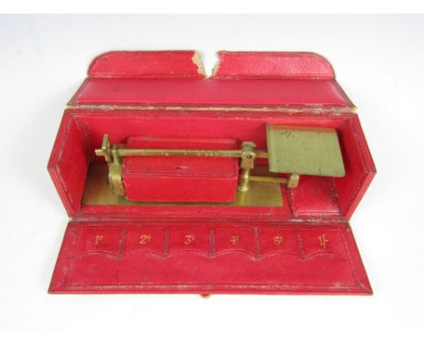 A set of Victorian brass postal scales by Sampson Mordan & Co, in a red Morocco leather fitted case 