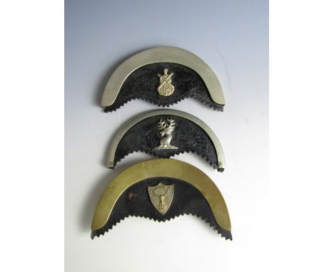 Three Highland Regiment other ranks' sporran cantles, first half 20th Century 