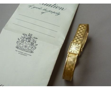 A 1960s lady's 9ct gold cased Tissot Stylist wrist watch, with 17 jewel manual wind movement and rectangular dial, with a bru