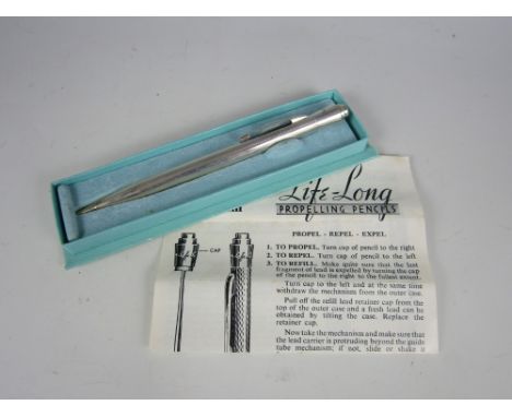 A 1960s cased Life-Long sterling silver propelling pencil, with guilloche engraving and monogram 