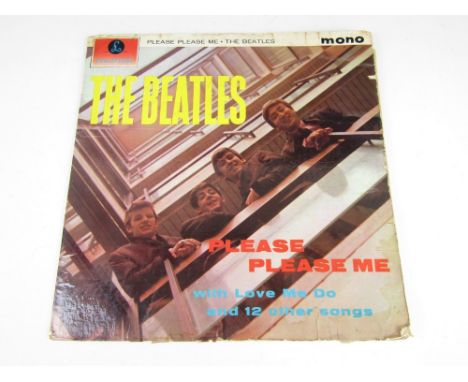 The Beatles Please Please Me LP, first pressing Parlophone PMC 1202 record, with black gold labels and credit to Dick James M