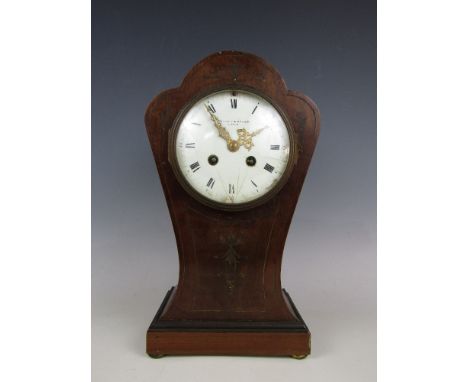 A late 19th Century French brass-inlaid mahogany mantel clock, having a two-train movement by Marti, the enamel face bearing 