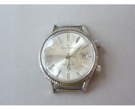 A 1960s Citizen Alarm Date wrist watch, having a 21 jewel manual wind movement, radially brushed silver face with luminous da