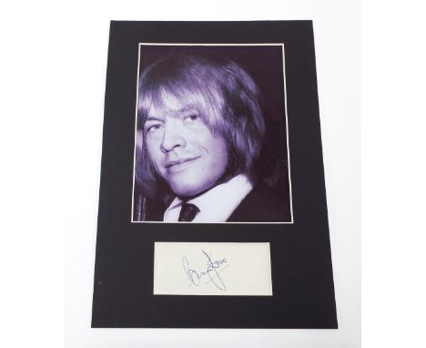 Brian Jones (Rolling Stones) - autograph in blue pen on a piece of paper, mounted below a picture of Brian Jones *Obtained at