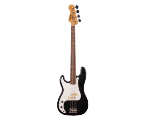 Encore bass guitar, black finish, soft case; together with an Encore left-handed bass guitar and a Stagg left-handed bass gui