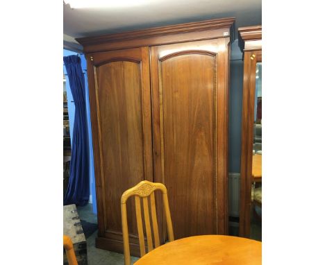 A late 19th century mahogany double door wardrobe