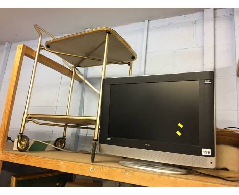 Shelf of assorted, TV etc.