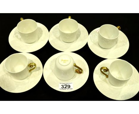 Set of six Langenthal white and gold porcelain coffee cups and saucers, each with different flower names to bottom of cups. N