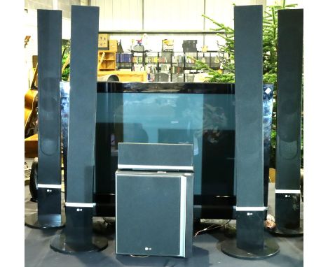 Fifty inch LG TV with four upright speakers one bass woofer and small speaker with control and power cable. Not available for