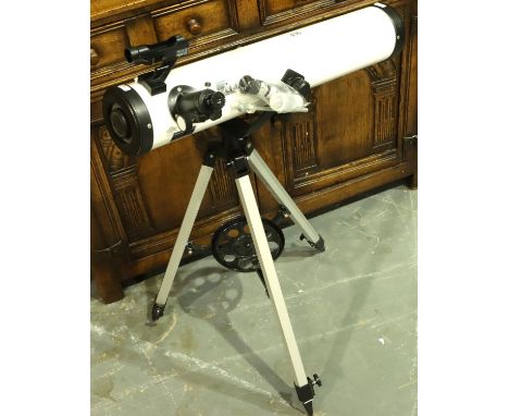 Telescope, 700mm focal length Newtonian reflector optics and 76mm aperture, includes 12.5mm eyepiece and a 20mm eyepiece; a r