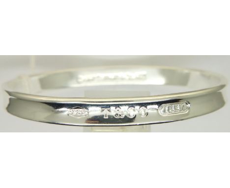 925 silver Tiffany and Co marked bangle, boxed, D: 60 mm, 27g. P&amp;P Group 1 (£14+VAT for the first lot and £1+VAT for subs