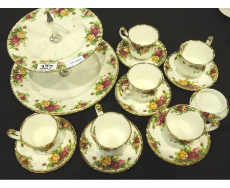 Fourteen pieces of Royal Albert first quality Old Country Roses with 1962 back stamp including six cups and saucers, a cake s