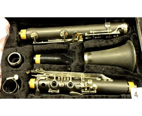 Cased resin clarinet with mouthpiece and spare reeds. Not available for in-house P&amp;P, contact Paul O'Hea at Mailboxes on 