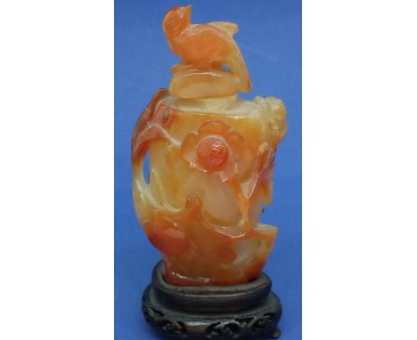 Carved white and orange jade snuff bottle with bird finial (lacking dropper) and carved bird and floral decoration, H: 88 mm,