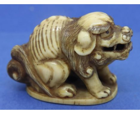 Ivory carved netsuke in the form of an animal, H: 28 mm, signed to base. P&amp;P Group 1 (£14+VAT for the first lot and £1+VA