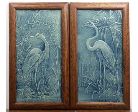Pierre Mallett (1836-1898) for Burmantofts Pair of framed faience ceramic tile plaques, depicting a flamingo and a heron, eac